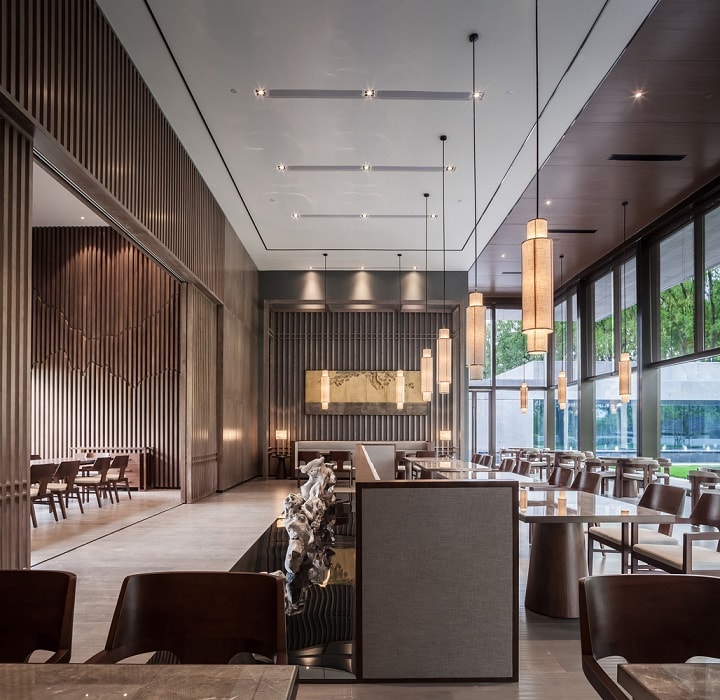 休閑茶樓裝修效果圖—現代門(mén)樓，曲折圓潤的中式藝術(shù)裝置